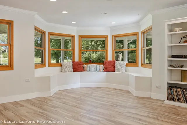 a large bedroom with a large bed and furniture