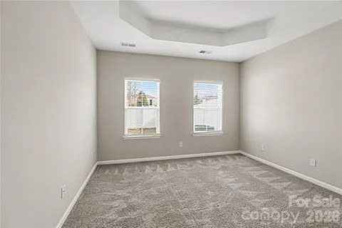 a bathroom with a shower and a toilet