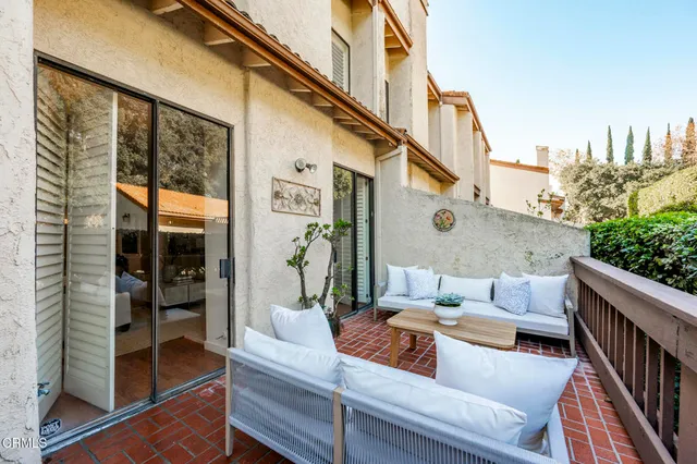 a view of outdoor living space with seating space