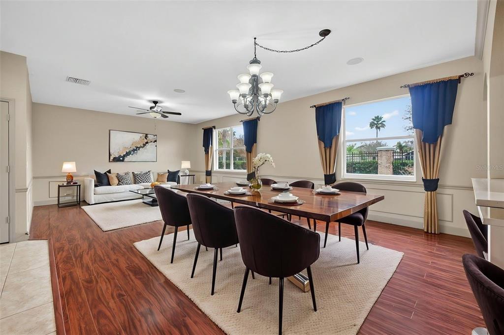 3463 Forest Ridge Lane Kissimmee, FL 34741 - Photo 11 of 58 a view of a dining room with furniture window and wooden floor