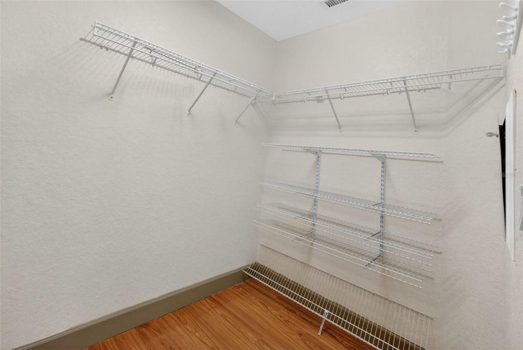 3463 Forest Ridge Lane Kissimmee, FL 34741 - Photo 40 of 58 a view of a room with racks on the wall