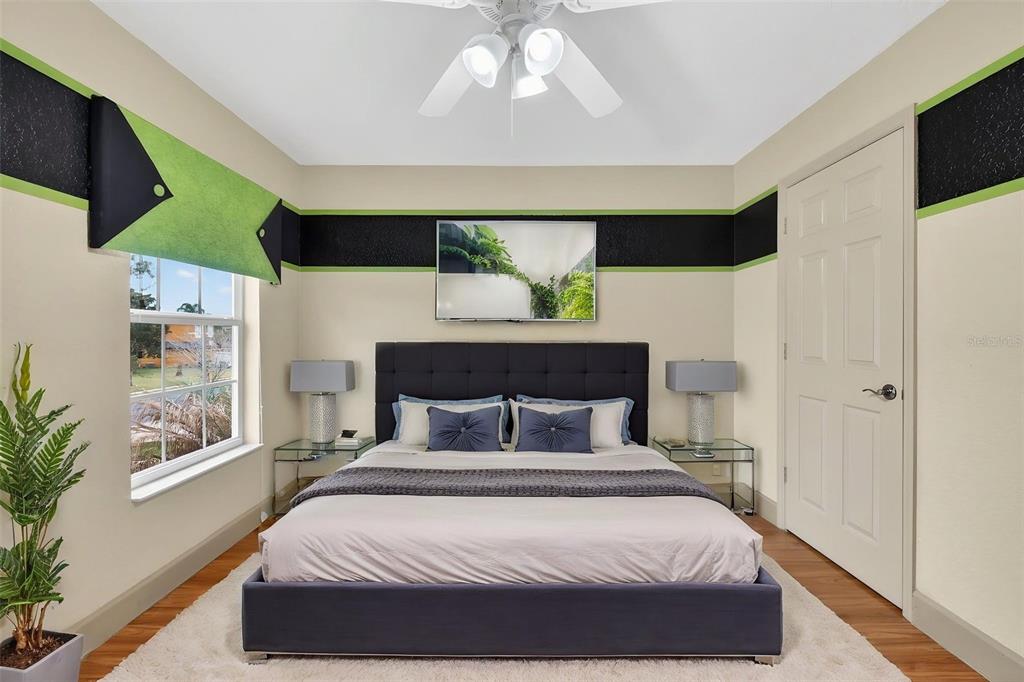 3463 Forest Ridge Lane Kissimmee, FL 34741 - Photo 46 of 58 a bedroom with a bed and window