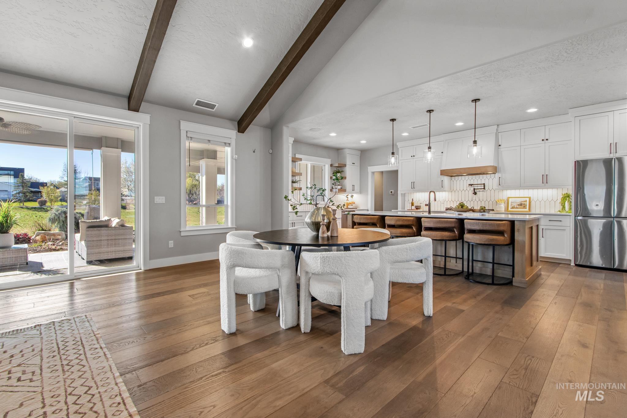 25427 Havard Oak Place Caldwell, ID 83607 - Photo 14 of 50 Dining space with dark wood-type flooring and recessed lighting