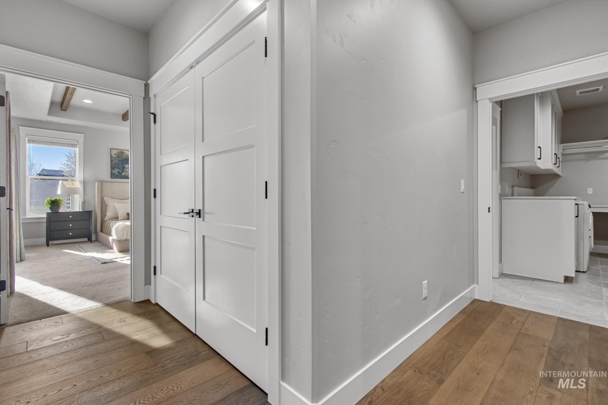 25427 Havard Oak Place Caldwell, ID 83607 - Photo 25 of 50 Corridor featuring light wood-style flooring, recessed lighting, and washer / clothes dryer