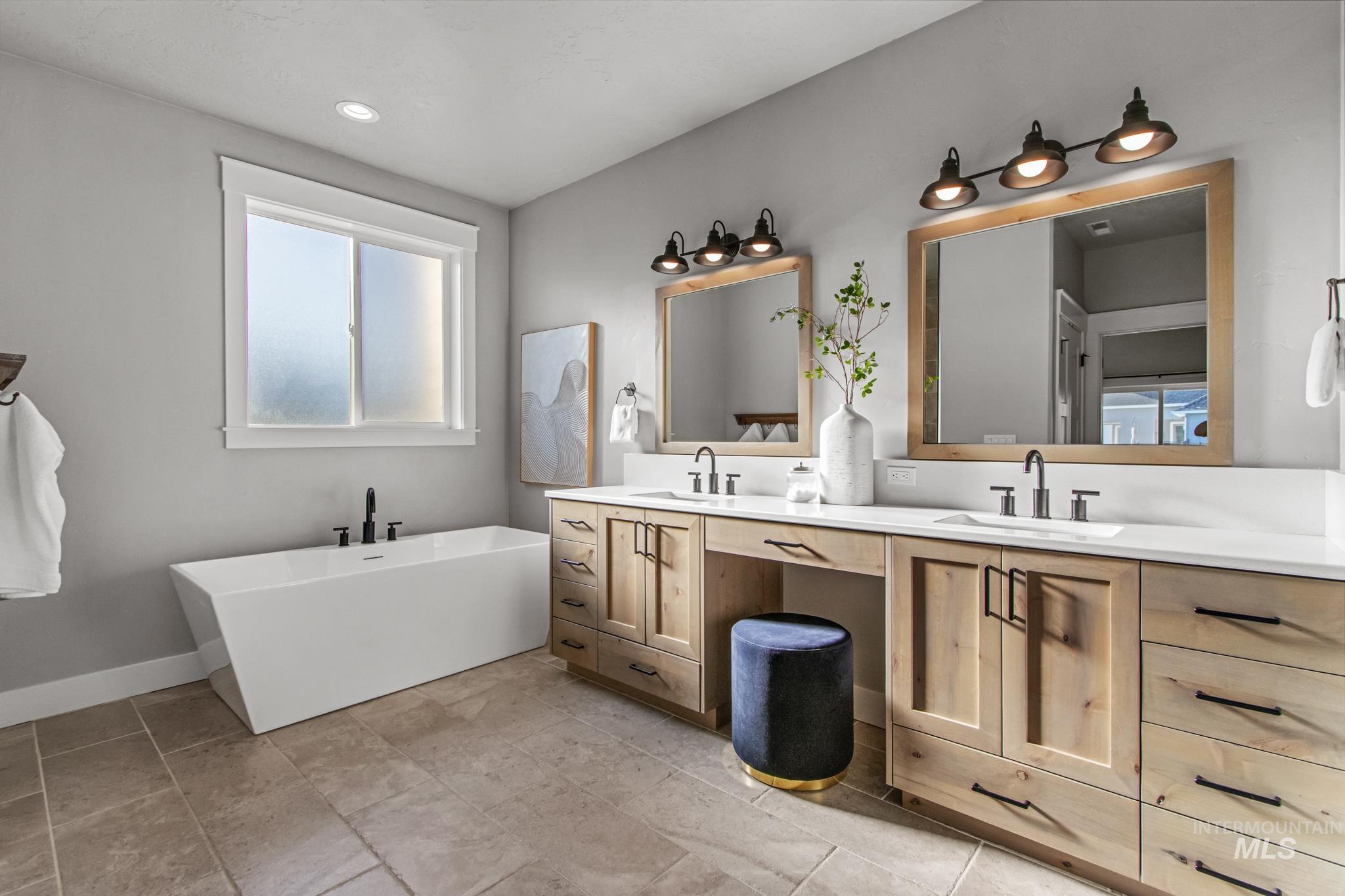 25427 Havard Oak Place Caldwell, ID 83607 - Photo 29 of 50 Full bath with a freestanding bath and double vanity