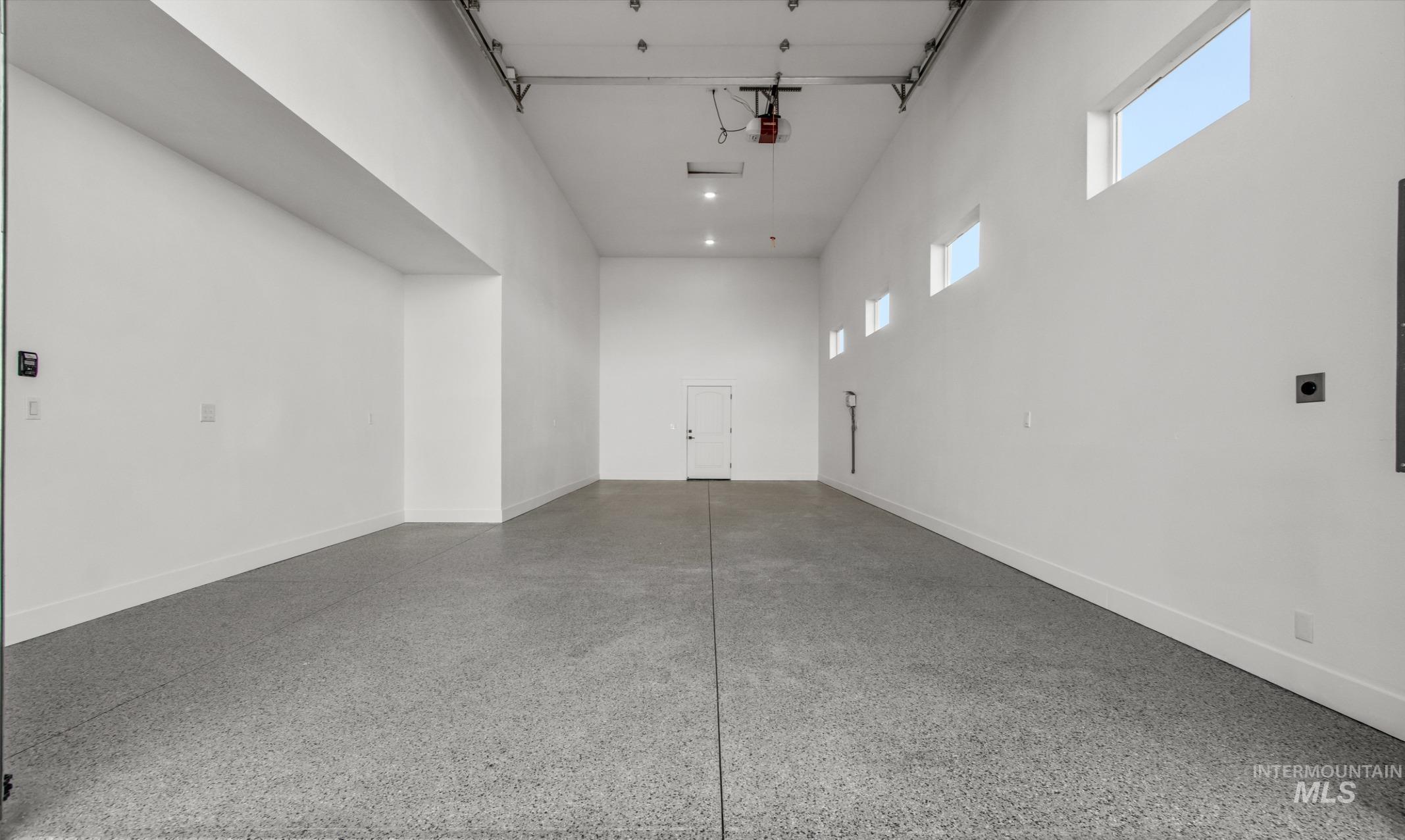 25427 Havard Oak Place Caldwell, ID 83607 - Photo 44 of 50 Garage featuring baseboards