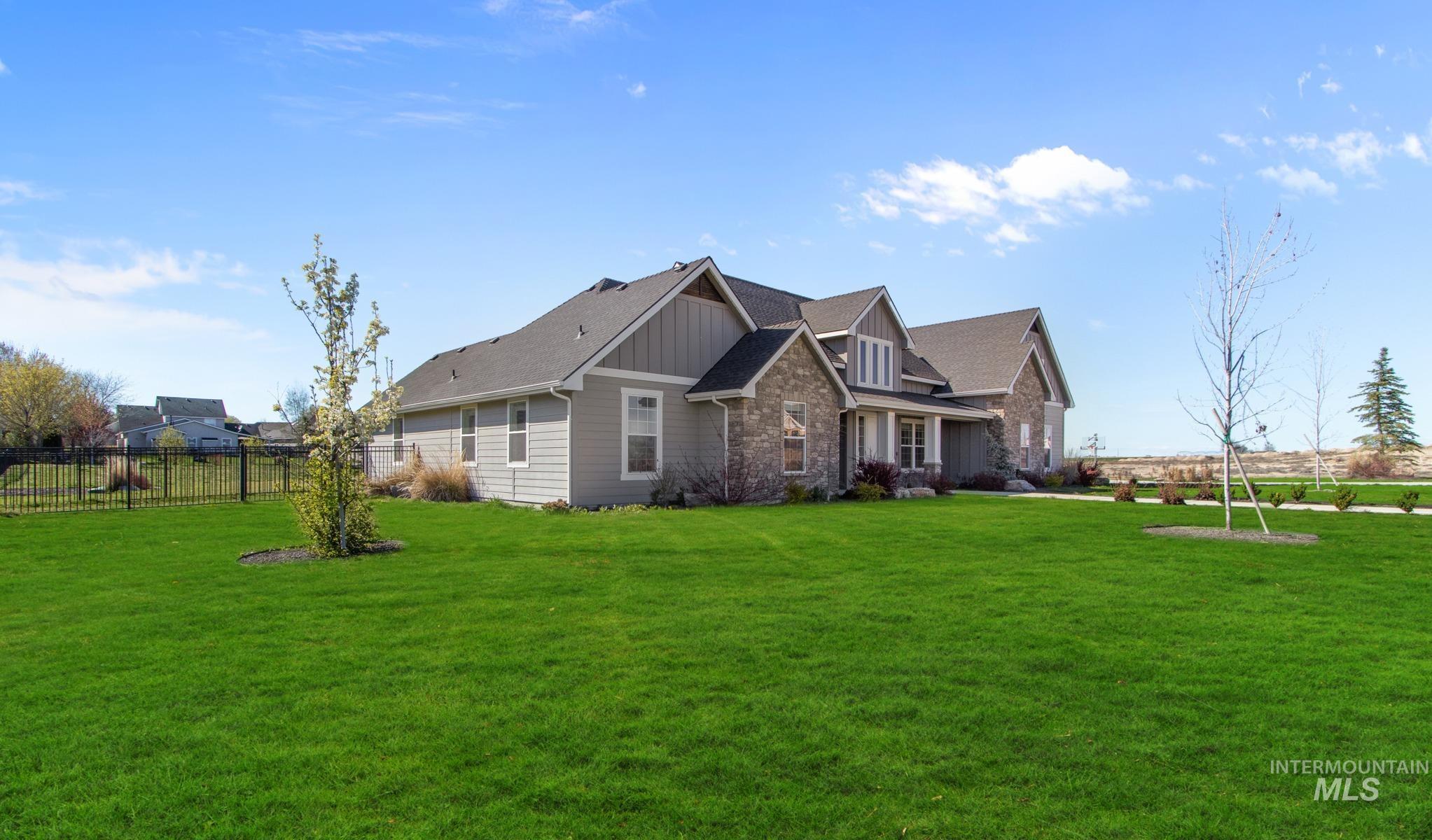 25427 Havard Oak Place Caldwell, ID 83607 - Photo 5 of 50 View of front of house featuring board and batten siding and stone siding