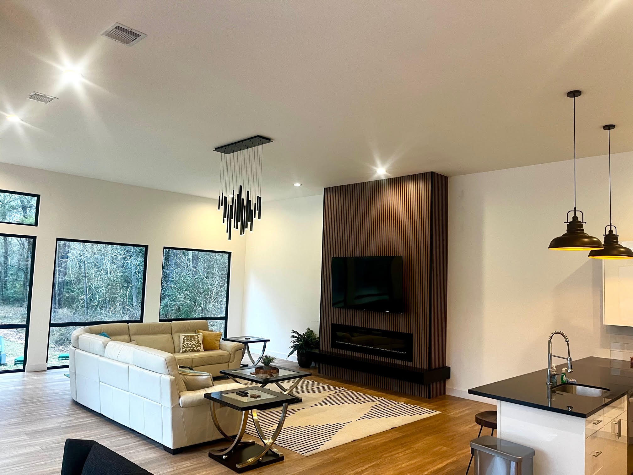 11571 Robin Lane Conroe, TX 77303 - Photo 12 of 49 a living room with furniture and a flat screen tv