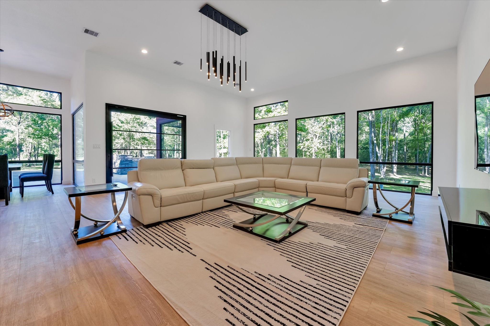 11571 Robin Lane Conroe, TX 77303 - Photo 13 of 49 a living room with furniture and a table
