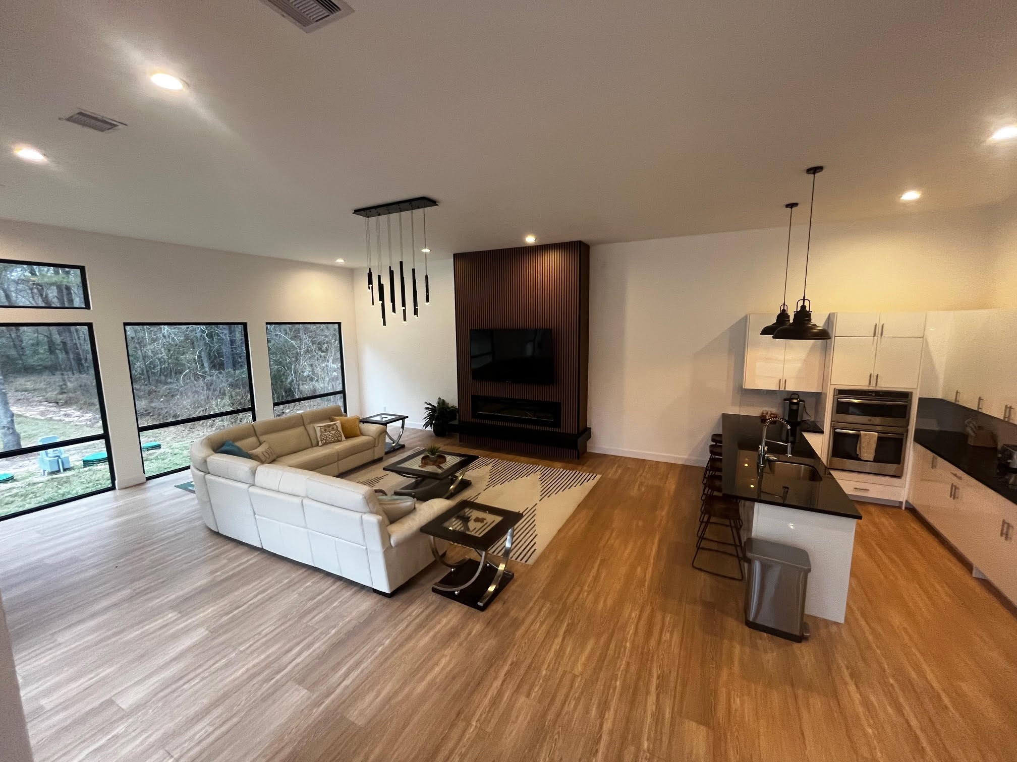 11571 Robin Lane Conroe, TX 77303 - Photo 14 of 49 a living room with furniture and wooden floor