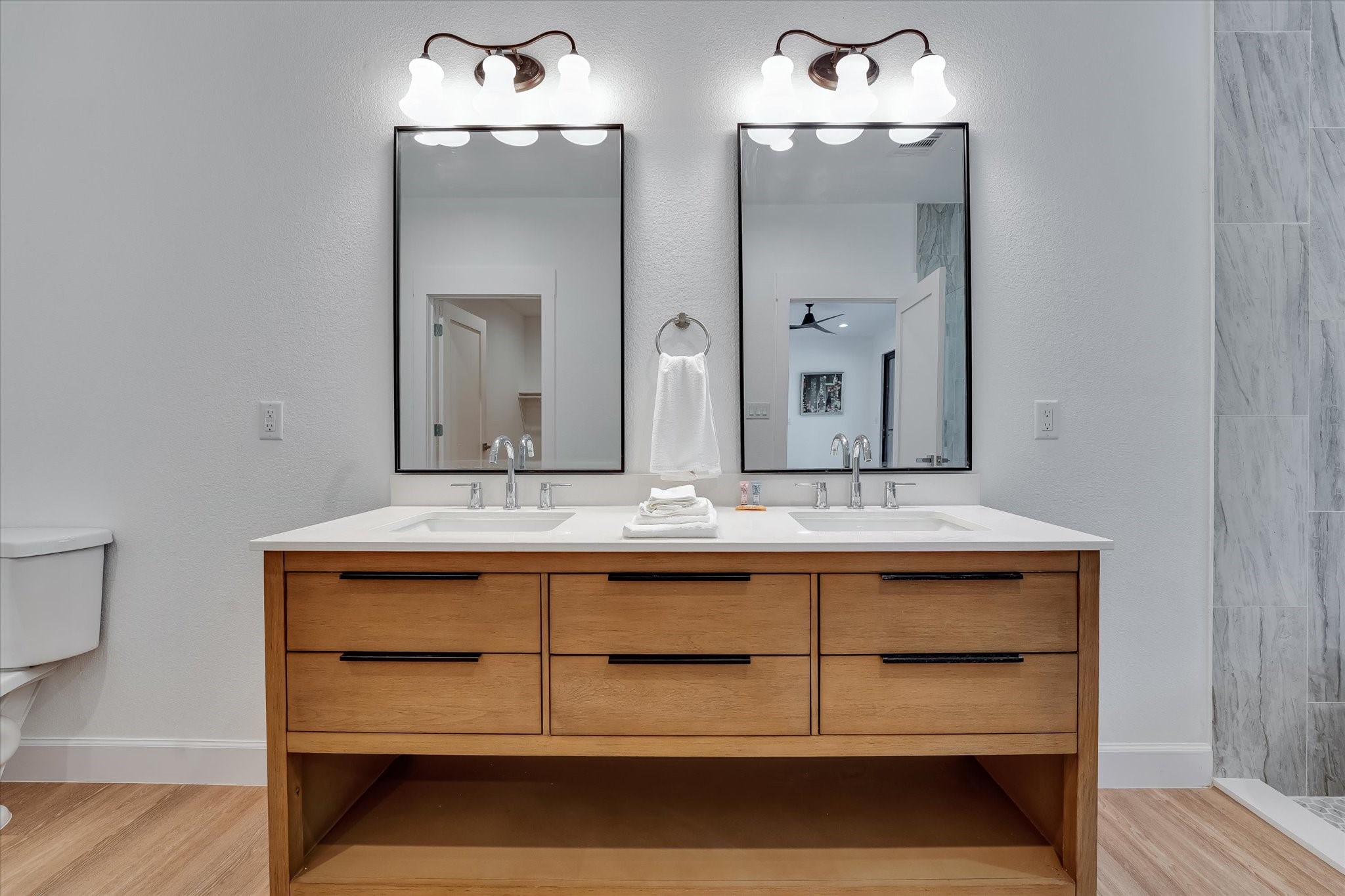11571 Robin Lane Conroe, TX 77303 - Photo 29 of 49 a bathroom with a sink and a mirror