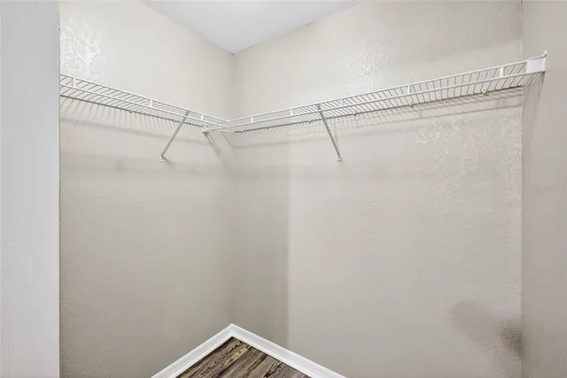 a view of a room with racks on the wall