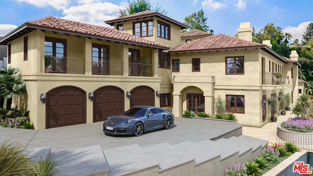 a front view of a house with a garden and a fireplace