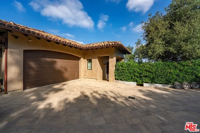 a view of a hallway view with living room and furniture