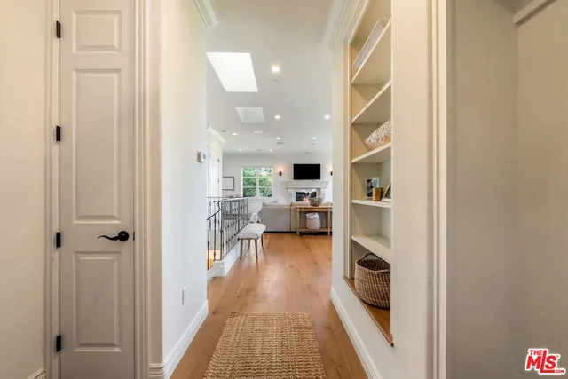 a living room with fireplace furniture and a flat screen tv