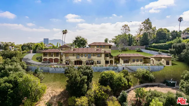 a view of a lake with a building in the background