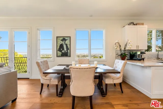 a living room with furniture fireplace and a flat screen tv