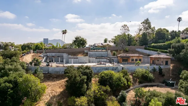 a view of a lake with a building in the background