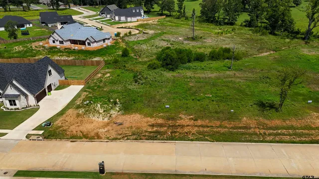 an aerial view of residential house with outdoor space