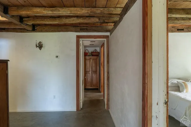 a view of a hallway with a closet
