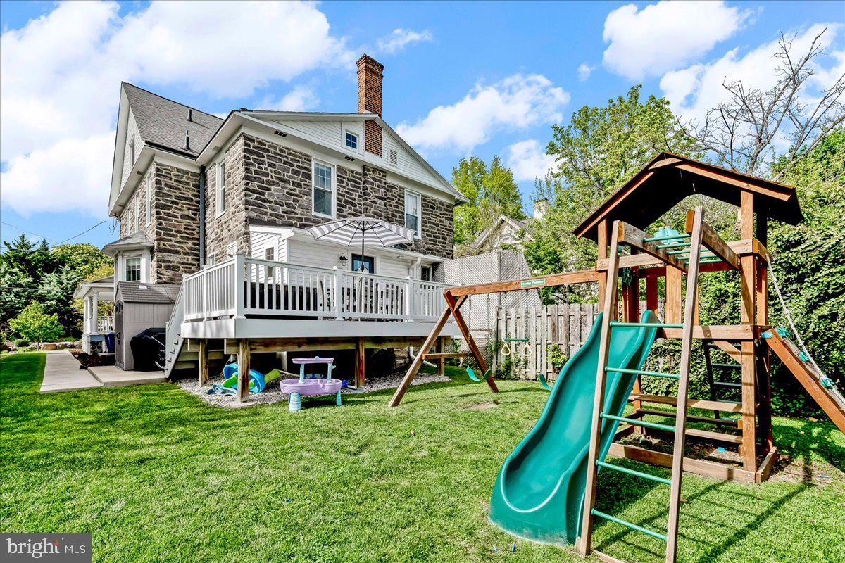 308 Chestnut Avenue Narberth, PA 19072 - Photo 26 of 66 a front view of a house with swimming pool and porch