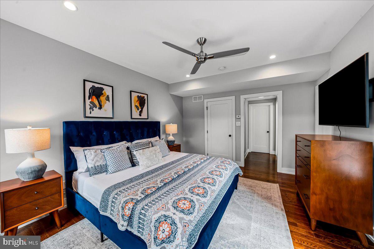 308 Chestnut Avenue Narberth, PA 19072 - Photo 29 of 66 a bedroom with a bed and a flat screen tv