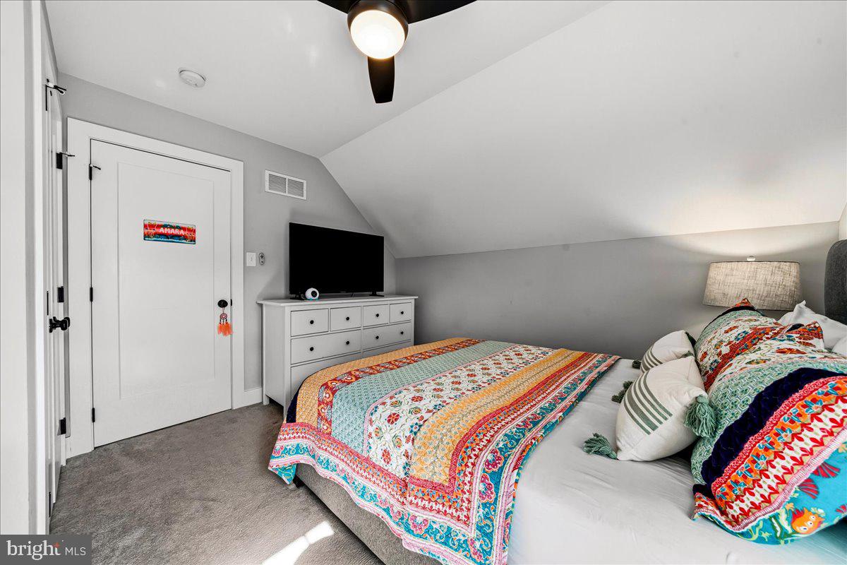 308 Chestnut Avenue Narberth, PA 19072 - Photo 41 of 66 a bedroom with a bed and flat screen tv