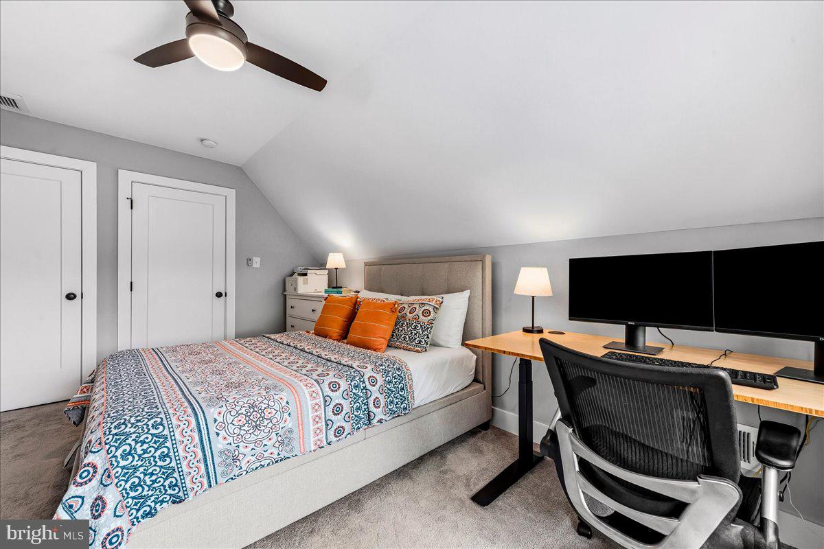 308 Chestnut Avenue Narberth, PA 19072 - Photo 43 of 66 a bedroom with a bed and a flat screen tv