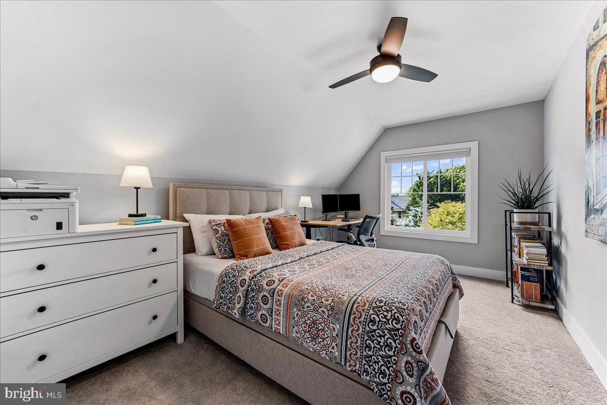308 Chestnut Avenue Narberth, PA 19072 - Photo 44 of 66 a bedroom with a bed and a chandelier