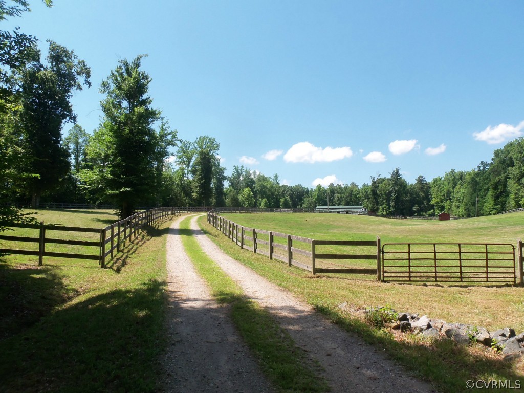 12641 Ivey Mill Road Chesterfield, VA 23838 - Photo 1 of 24 a view of a swimming pool with a yard