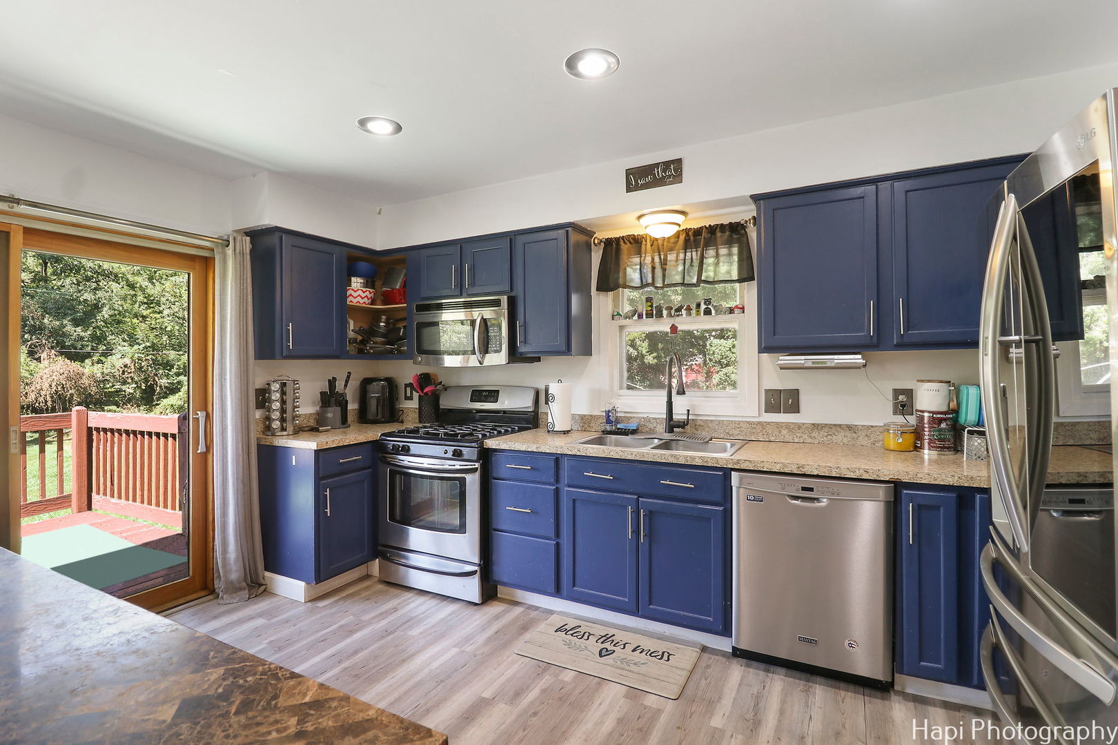 1340 Cary Road Algonquin, IL 60102 - Photo 6 of 21 a kitchen with stainless steel appliances granite countertop a stove sink and cabinets