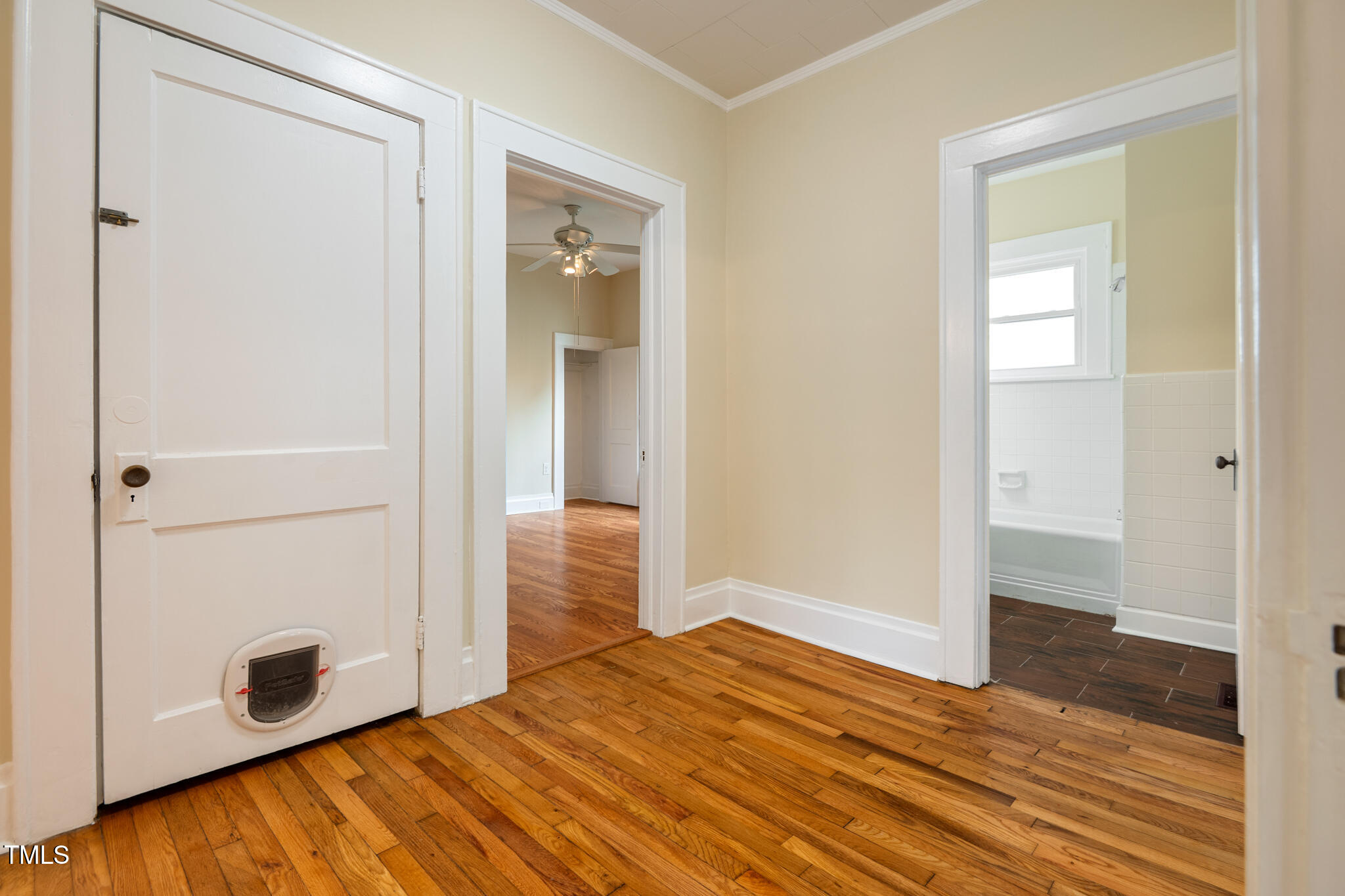 2909 Chapel Hill Road Durham, NC 27707 - Photo 20 of 39 Hallway with door to large, tiled closet