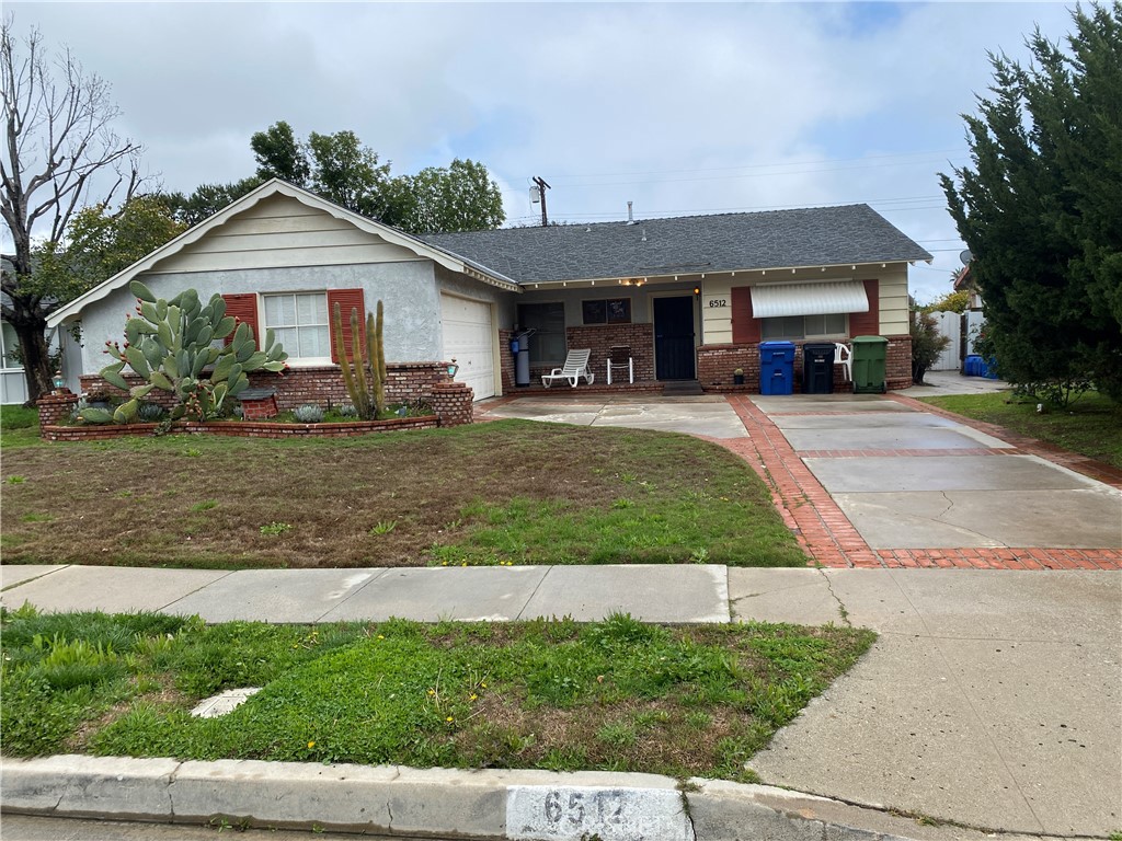 6512 Franrivers Avenue West Hills, CA 91307 - Photo 2 of 24 a front view of a house with a yard