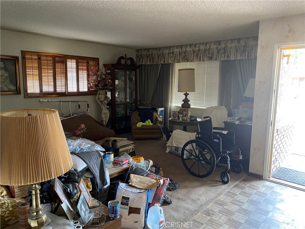 6512 Franrivers Avenue West Hills, CA 91307 - Photo 24 of 24 a view of a livingroom with furniture and a window