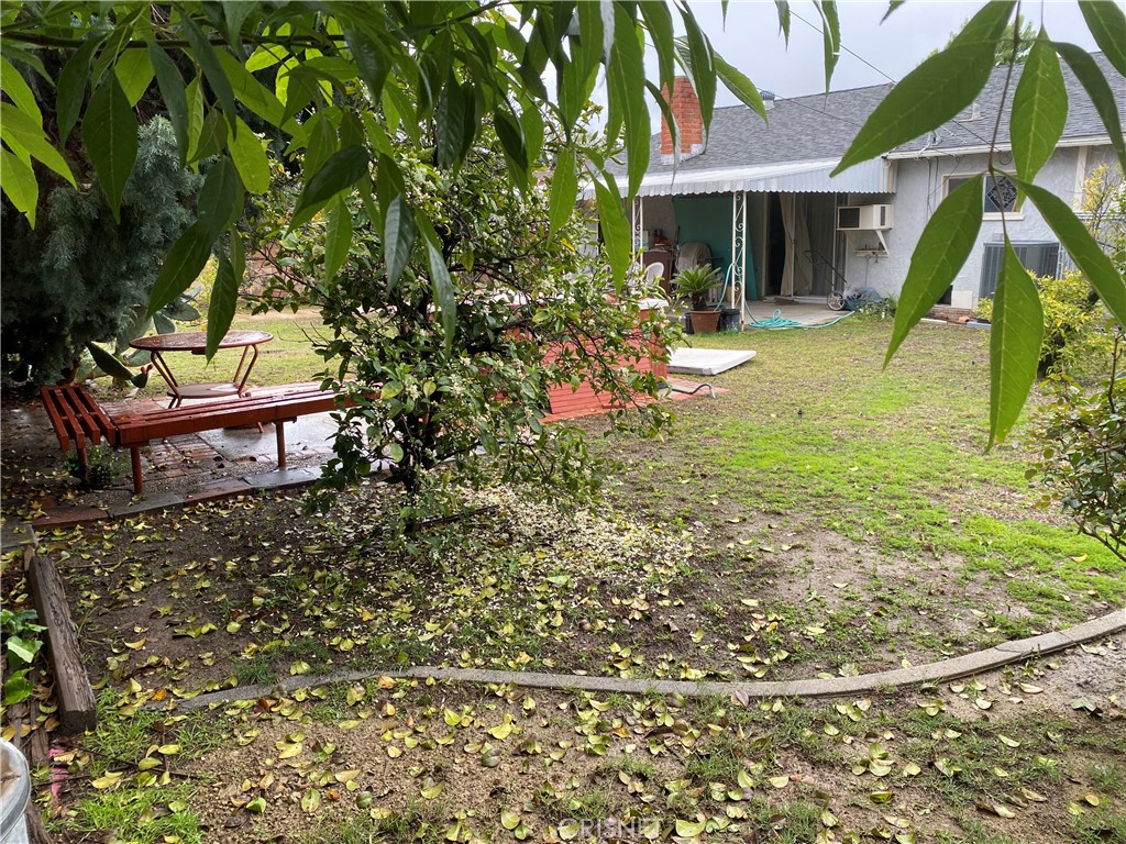 6512 Franrivers Avenue West Hills, CA 91307 - Photo 6 of 24 a view of a house with a yard siting area and garden