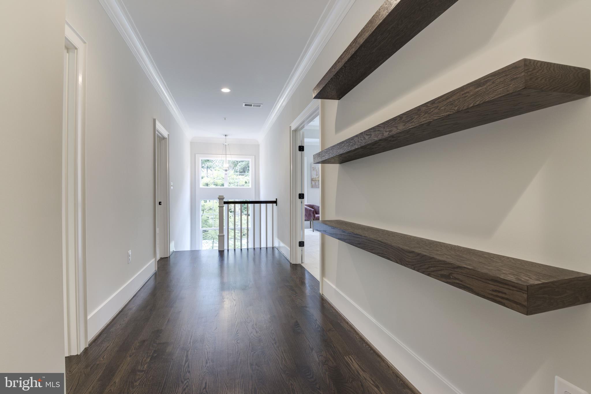 8609 Seven Locks Road Bethesda, MD 20817 - Photo 19 of 45 Upper level hallway with floating shelves