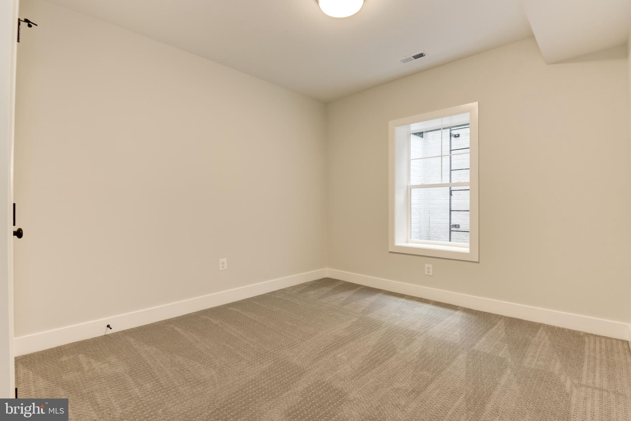 8609 Seven Locks Road Bethesda, MD 20817 - Photo 40 of 45 Lower level bedroom