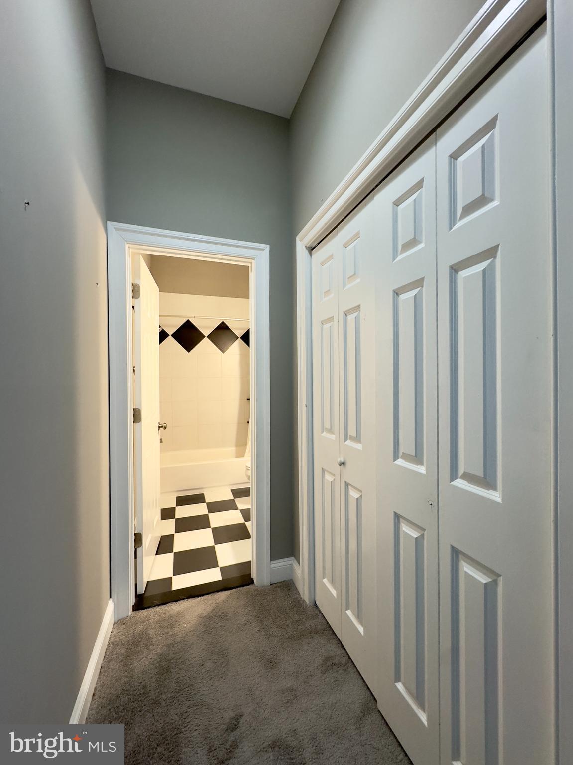 803 Cathedral Street, Unit 4 Baltimore, MD 21201 - Photo 6 of 12 a view of a room with a furniture and floor to ceiling window