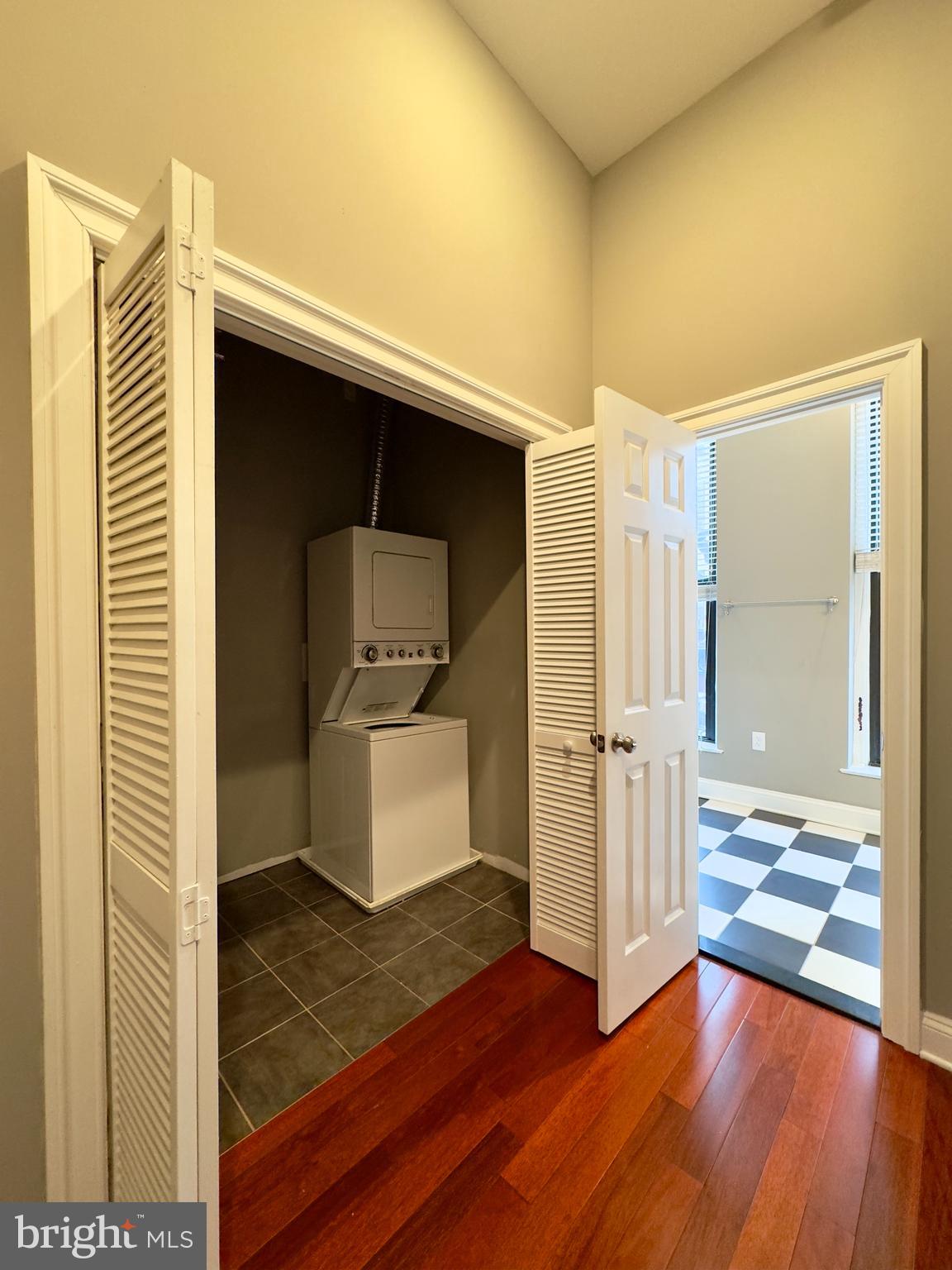 803 Cathedral Street, Unit 4 Baltimore, MD 21201 - Photo 9 of 12 a view of a livingroom with wooden floor and furniture