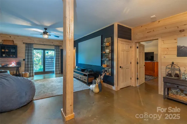 a view of a livingroom with furniture and windows