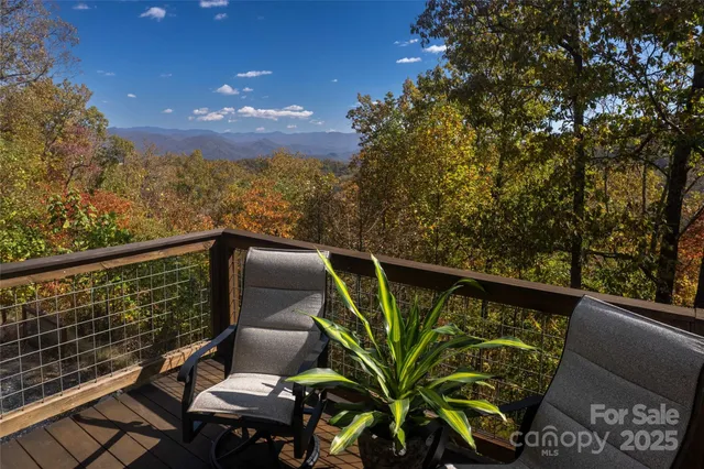a view of balcony with furniture
