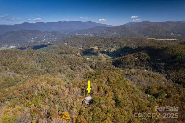 a view of a street with a mountain