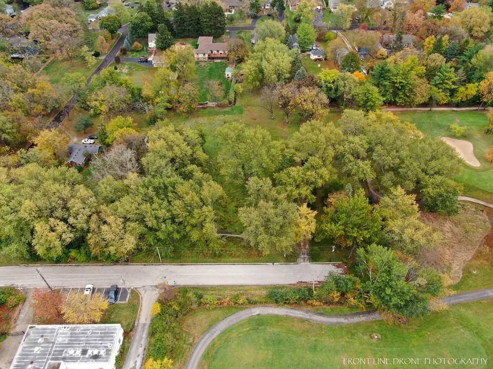 5609 River Road Lisle, IL 60532 - Photo 10 of 11 a view of a yard with a house