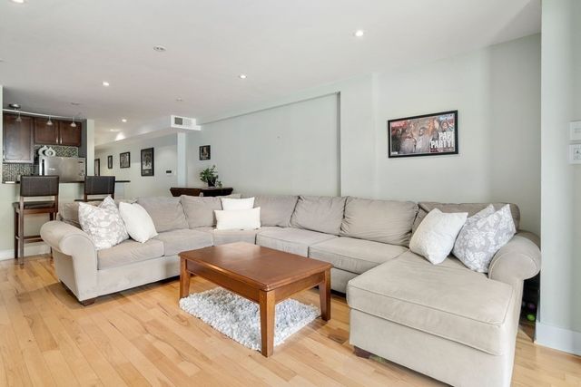 a living room with furniture and a couch
