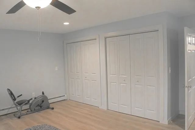an empty room with fan