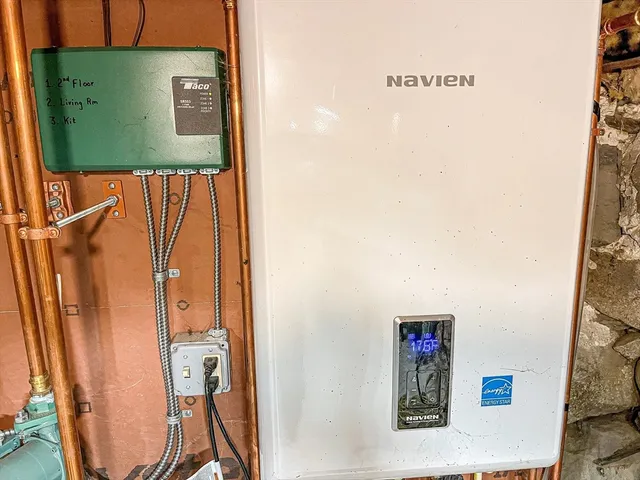 a view of a white house with a patio