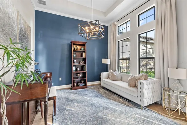 a bedroom with a bed and a couch
