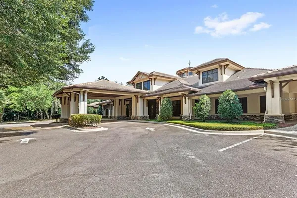 an aerial view of residential house with outdoor space and street view