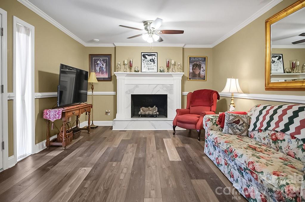122 Rockman Road Grover, NC 28073 - Photo 12 of 45 a living room with furniture fireplace and flat screen tv