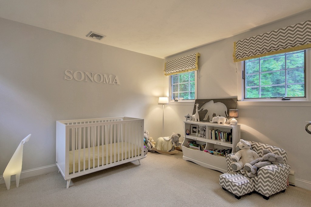 126 Taylor Road Stow, MA 01775 - Photo 11 of 16 a bedroom with furniture and a window
